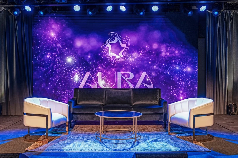 on stage at Aura Live, a top Nashville venue