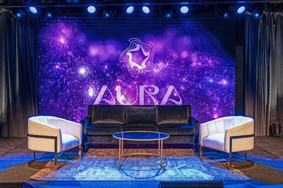 on stage at Aura Live, a top Nashville venue