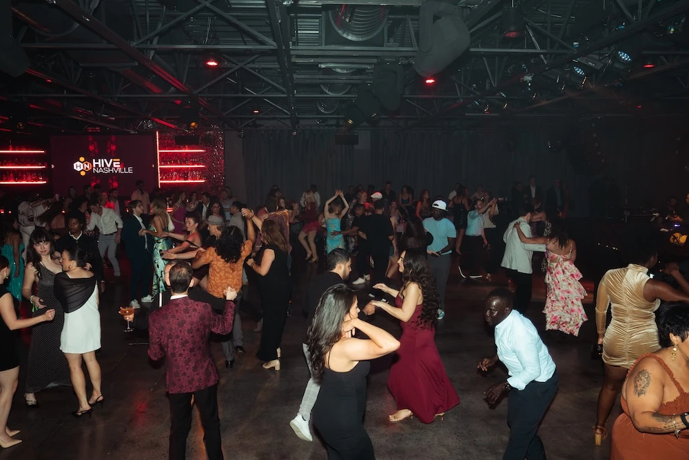 people dancing at Aura Live, one of the most unique venues in Nashville