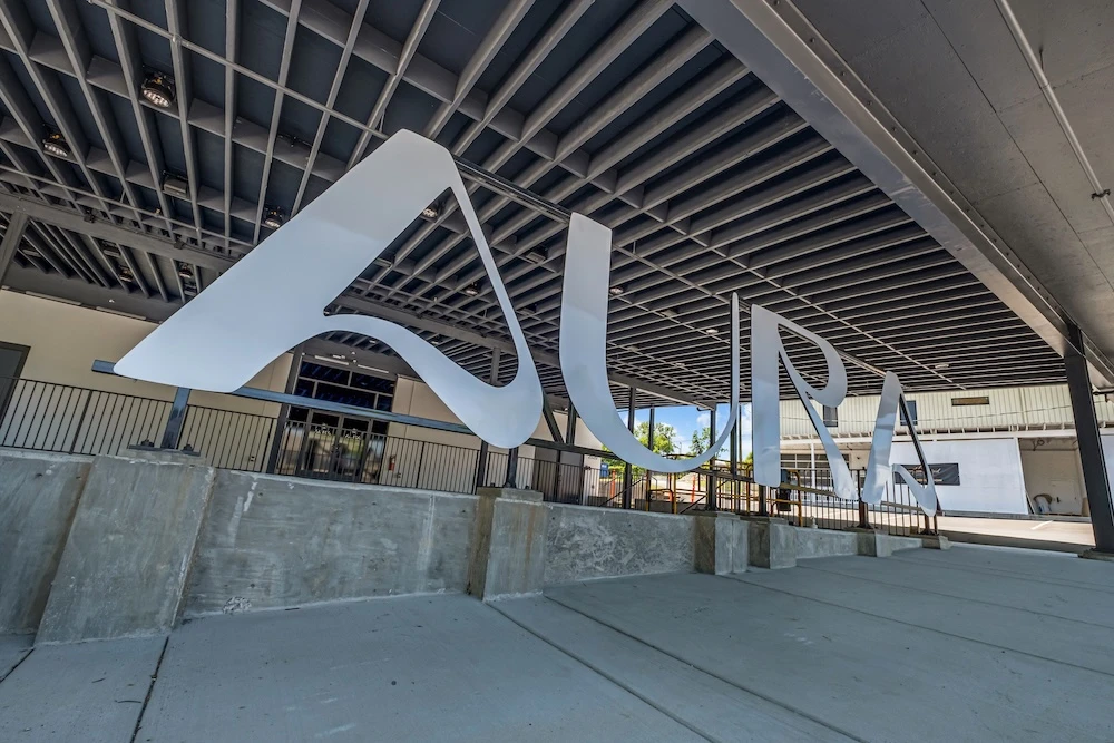 Aura Live sign at our event space in Nashville